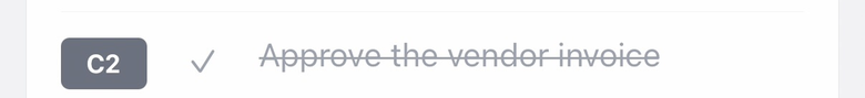 A completed task: the row starts with ✓ and the task name has a line through it