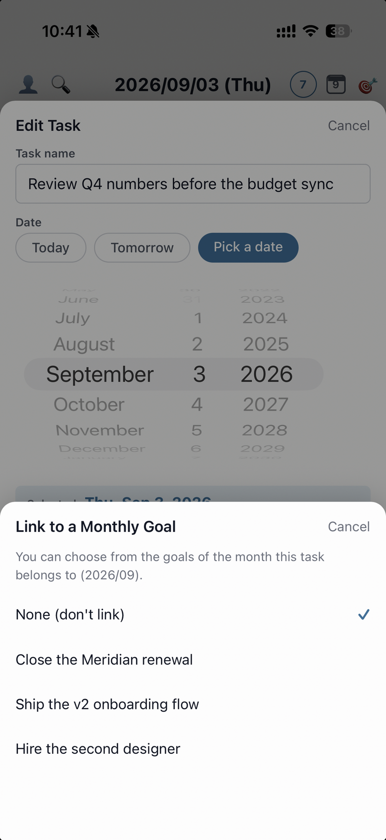 The goal picker opened from the Monthly Goal row in the task edit screen, listing that month's goals